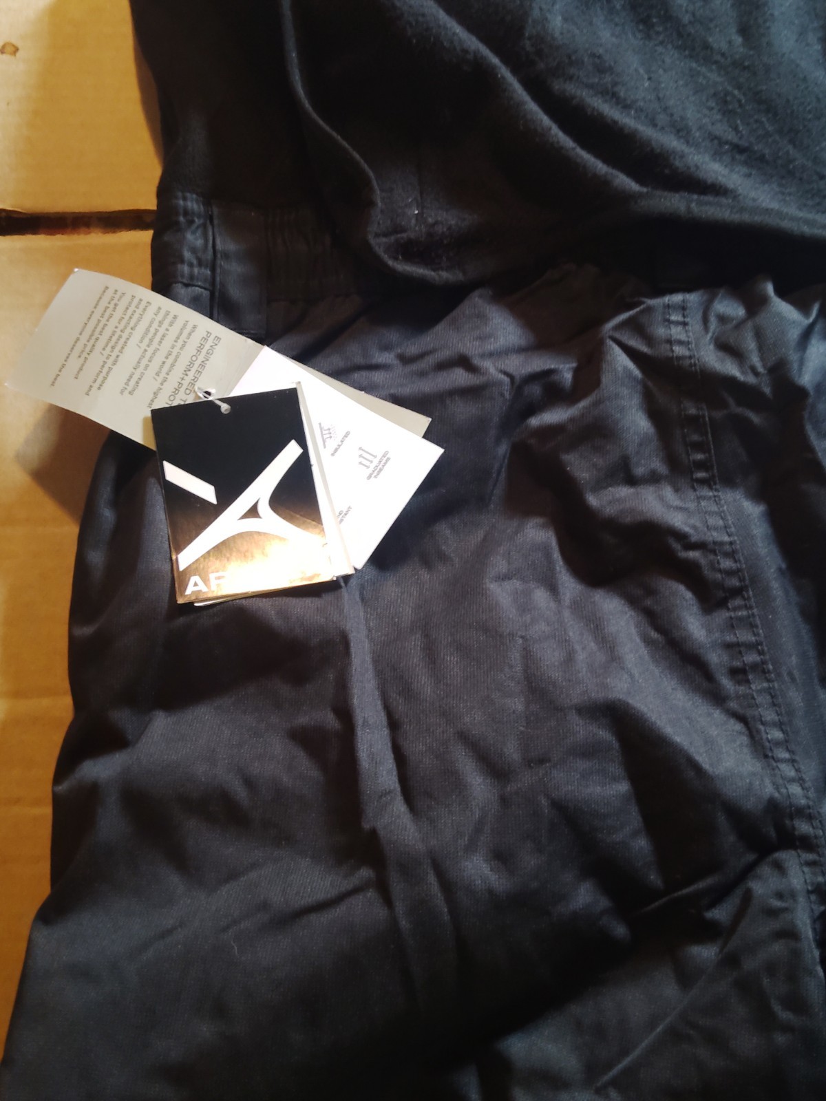 L(14/16)Arctix Black Overall Water Repellent Full Sleeveless Suit