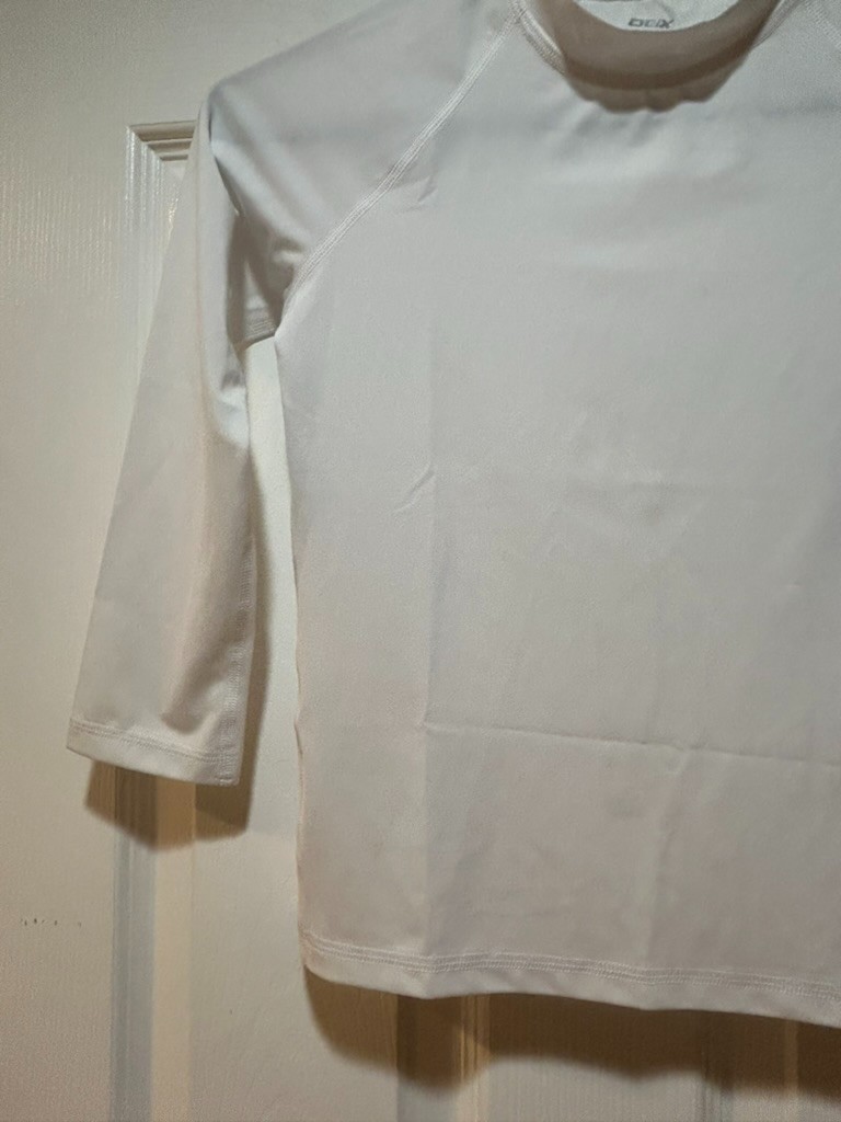 NWT DBX Unisex youth size XS White Rash Guard Long Sleeve Swim Shirt UPF 50+