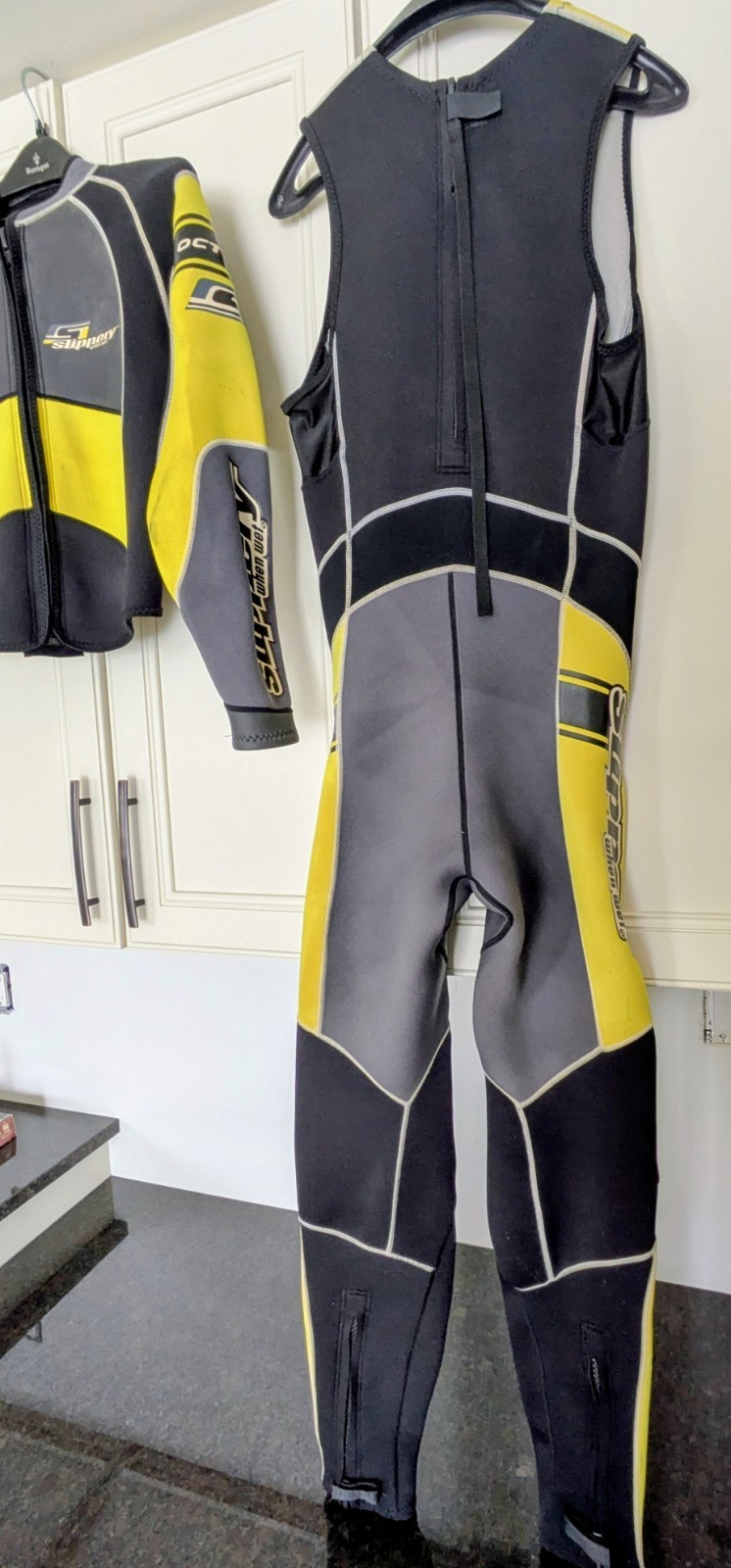 Four Piece Slippery When Wet Formula Wetsuit. Includes Shoes And Gloves.