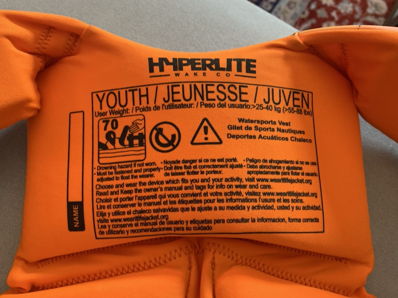 HYPERLITE Wake Co. Youth Life Vest Orange/Gray/Turq 55-88 lbs USCG Approved
