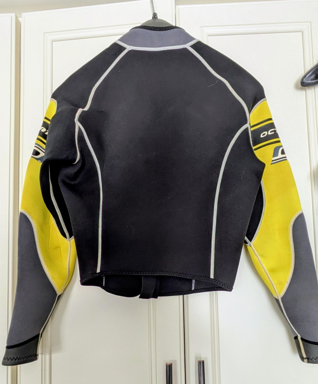Four Piece Slippery When Wet Formula Wetsuit. Includes Shoes And Gloves.