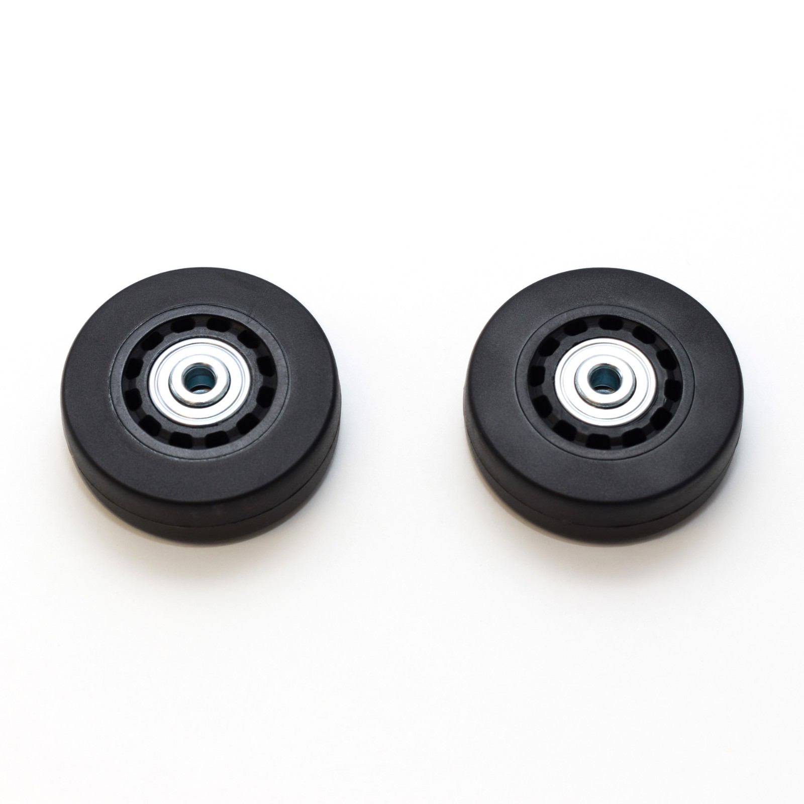 2 Original Pelican 1510 / 1560 black replacement wheels. Made by Pelican