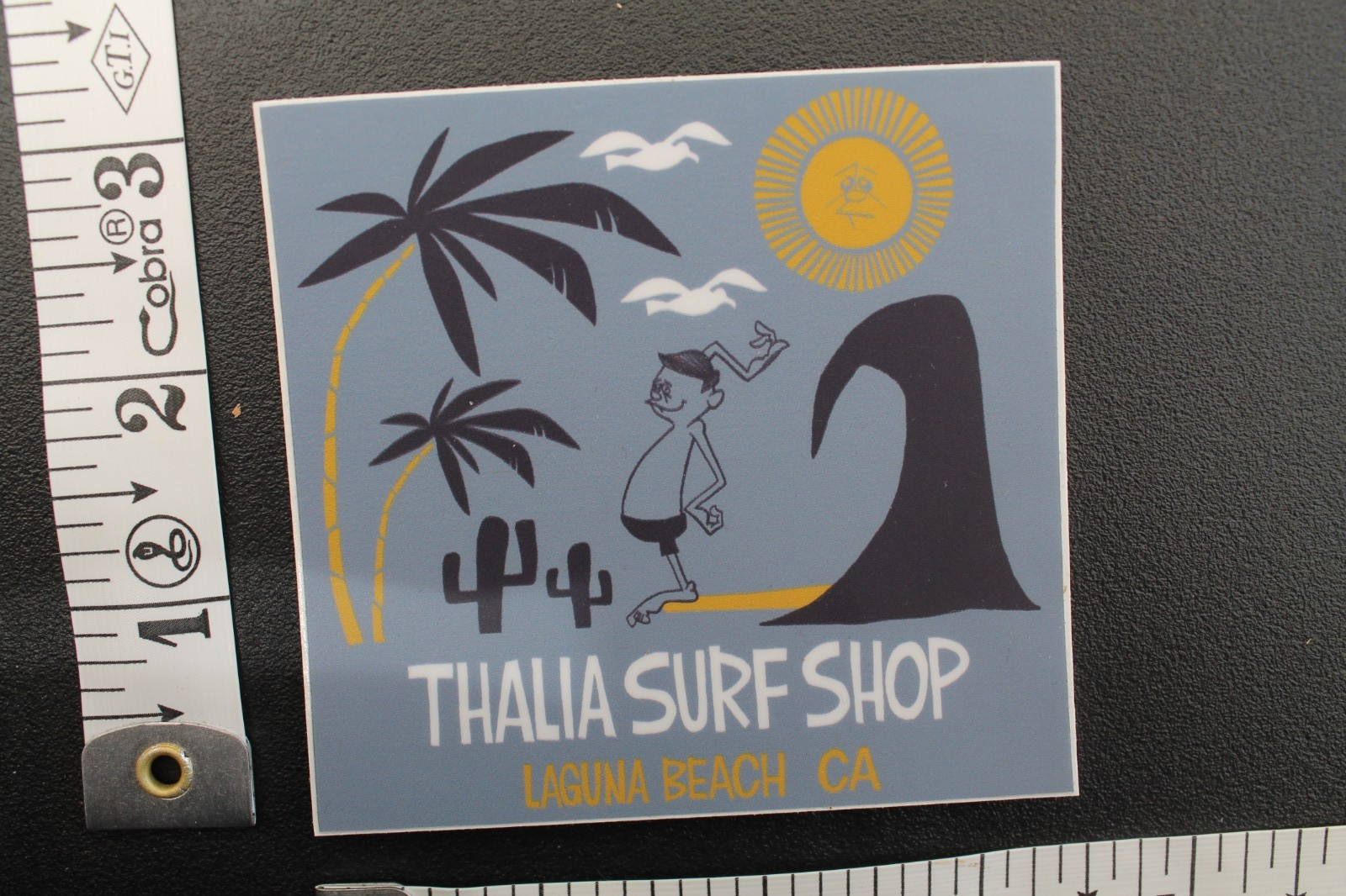 Thalia Surf Shop Laguna Beach CA Surfer Cartoon Grey V7C Vintage Surfing STICKER