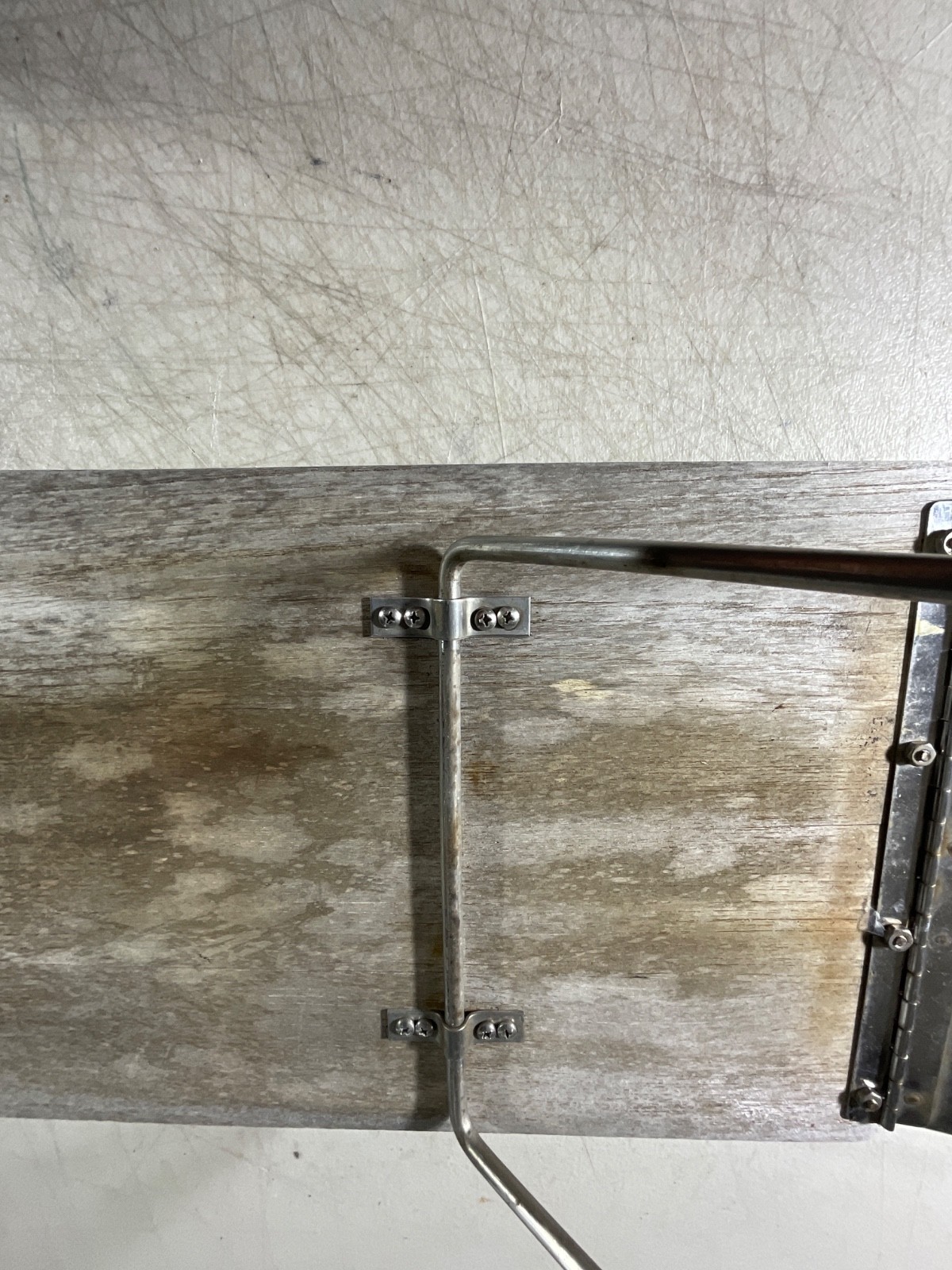 Edson teak folding cockpit table 11″x22” with stainless hardware brackets. 9-1/2