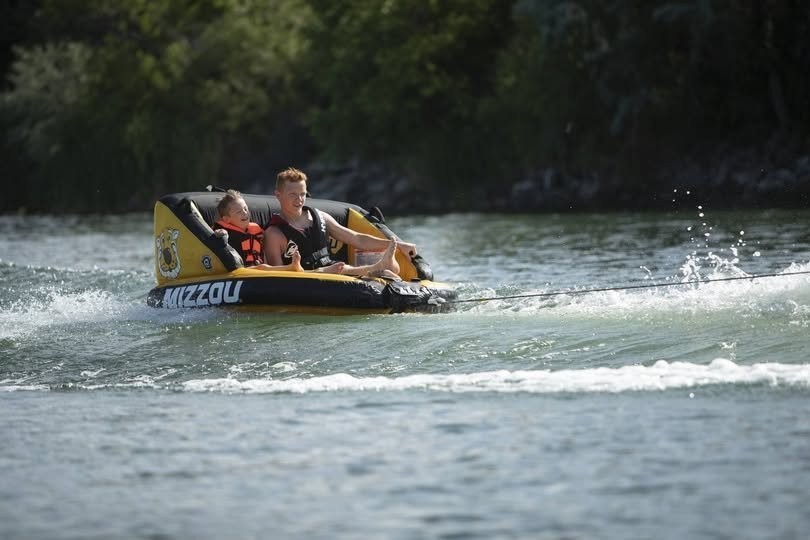 Collegiate Waves “The Coach” 3-Person Towable Tube – Inflatable Couch Style Boat