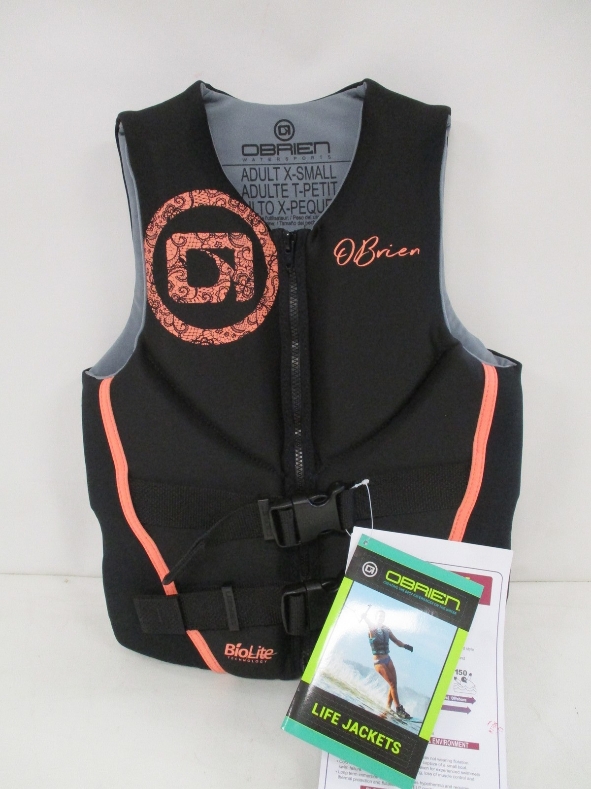 O’BRIEN WOMEN’S TRADITIONAL LIFE JACKET SIZE X-SMALL BLACK & CORAL 2231981