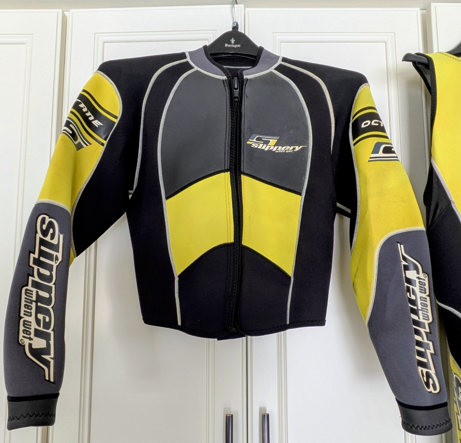 Four Piece Slippery When Wet Formula Wetsuit. Includes Shoes And Gloves.