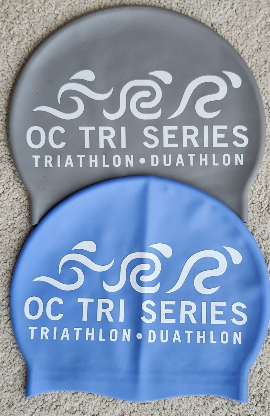 Two OC Tri Series Adult Silicone Swim Caps, Blue and Gray, Pre-Owned Worn Once